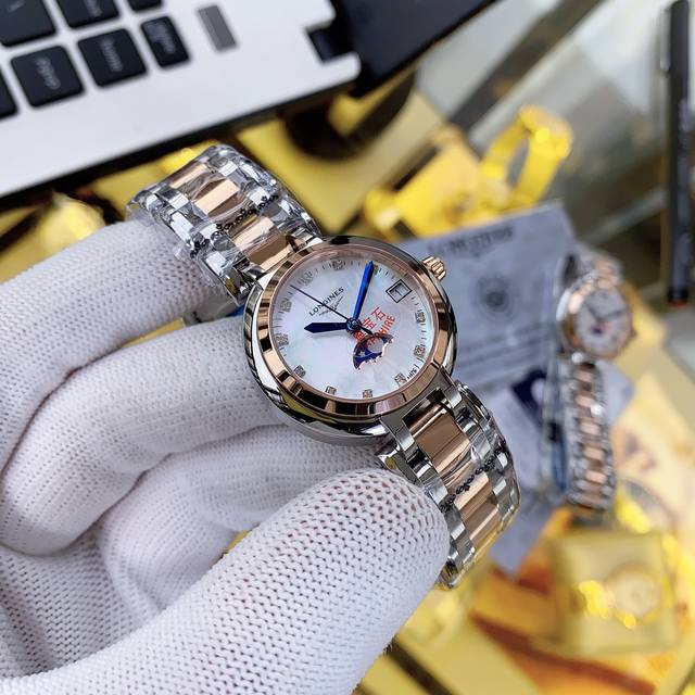 实物拍摄 浪琴心月系列月相女士腕表 台湾厂 采用独家定制真月相 每月转一圈正品一致 石英机芯 精钢圆形表壳 表径30.5Mm 抗磨损合成双卜蓝宝石玻璃 数据同步