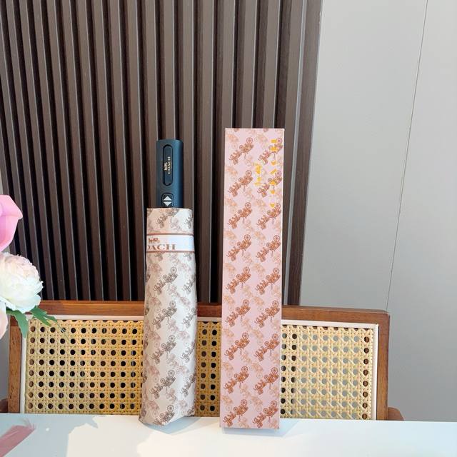 Coach's new summer fully automatic folding umbrella The black coating effectivel