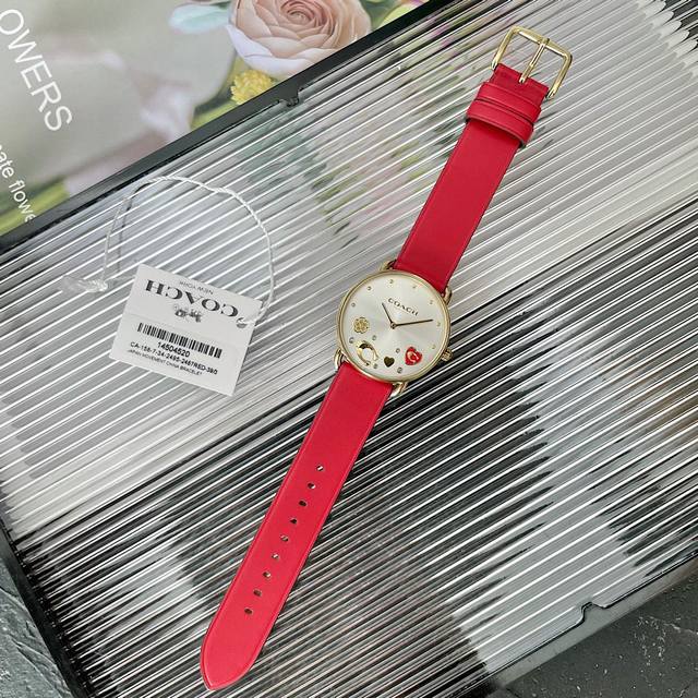 Coach 蔻驰Elliot系列爱心山茶花石英女士手表女表，日晖纹表盘，无数字极简设计，大C字Logo. 经典山茶花搭配爱心，浪漫吸睛！型号：14504295，