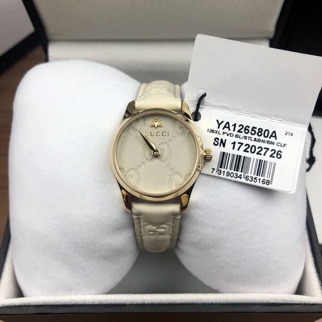 古驰石英女士腕表，表径28Mm，水晶玻璃，黄金色Pvd镀层表壳，Gucci 棕志性Gg图案呈现于表盘和黑色皮带上