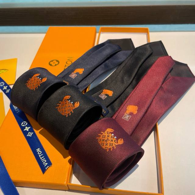 Lv Crab Silk tie is dyed in deep tones and features the iconic Monogram pattern