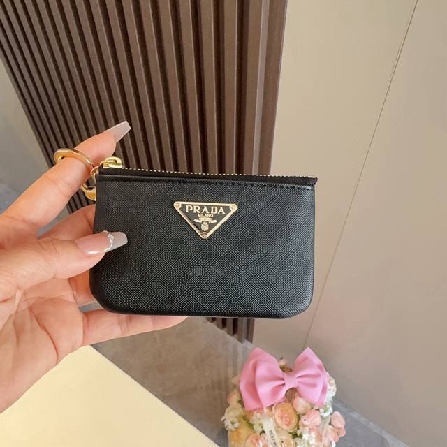 Prada coin purse earphone bag, bag pendant, can hold lipstick earphones and oth