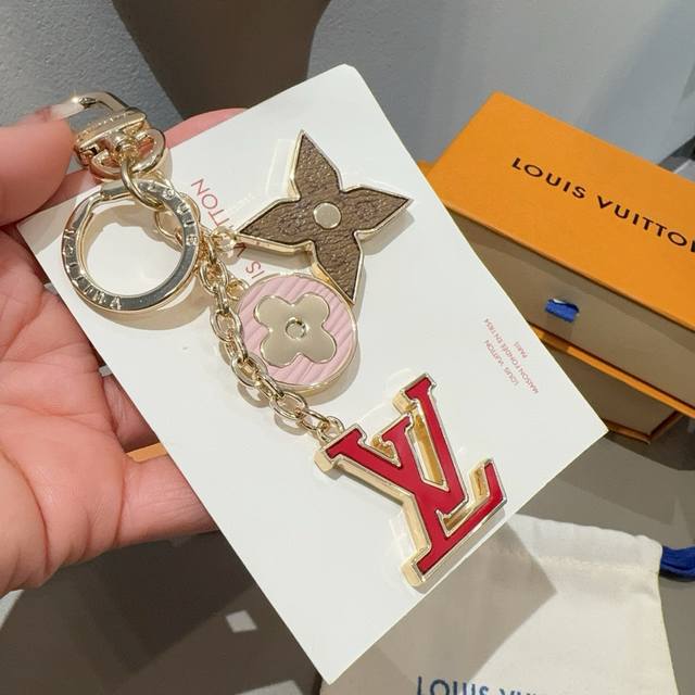 Lv Keychain Bag PendantThe Spring Street Chain bag charm transforms classic elem