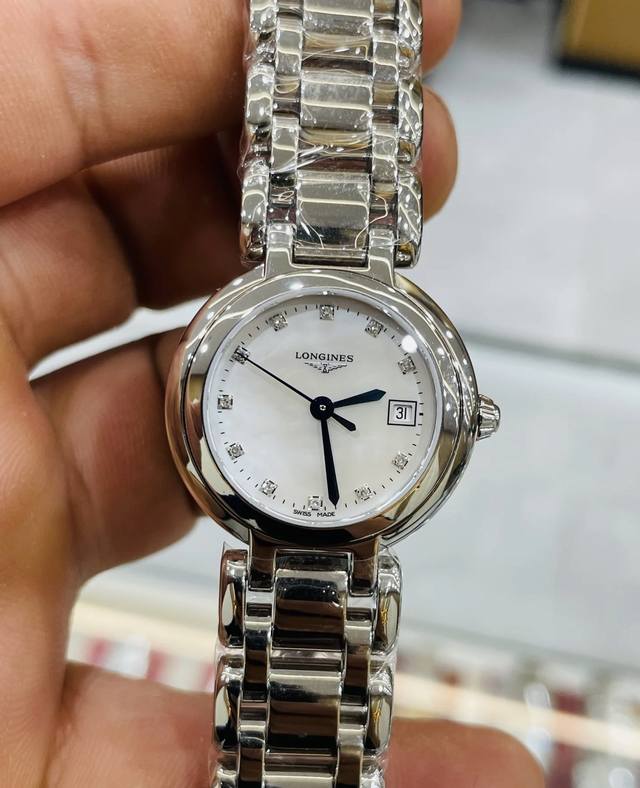 Ky新品推荐 浪琴心月 L8110.4.87.6，经典浪琴系列-休闲时尚女士石英腕表，26.5毫米的表盘搭配罗马刻度，轻易就可识别时间，淬火烤蓝指针的设计为这款