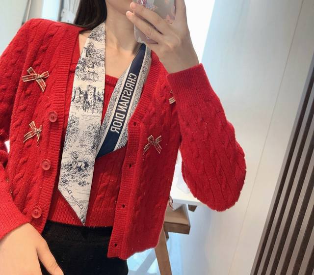 This Mitzah scarf is crafted from white and navy silk twill and adorned with the