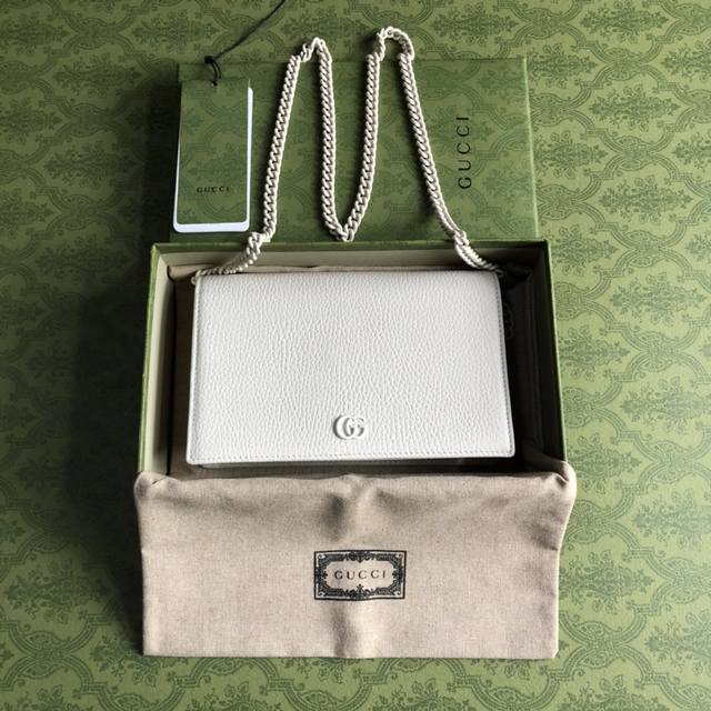 Top-of-the-line version with a green box featuring G's new small Double G metal