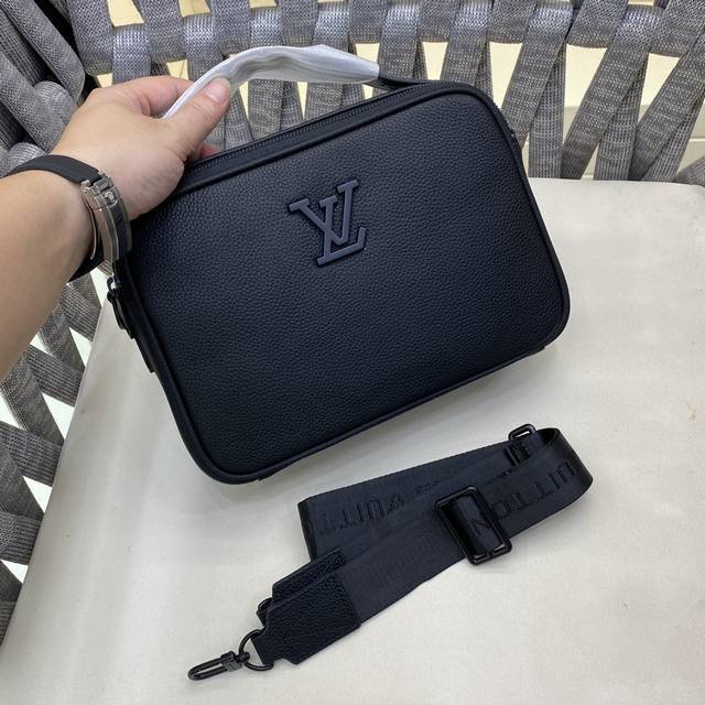 Louis Vuitton's printed and embossed messenger bag, a classic travel accessory,