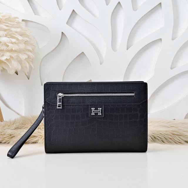 Hermes - Hermes' latest men's clutch is made of premium calfskin leather with a