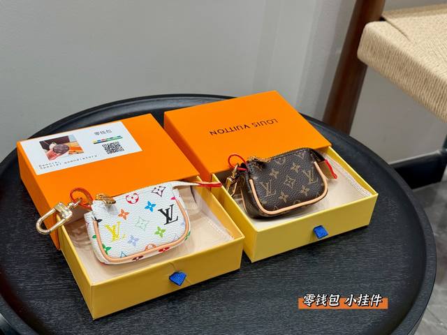 Lv Mini pendant is a keychain and coin purse, super mini and cute DDD