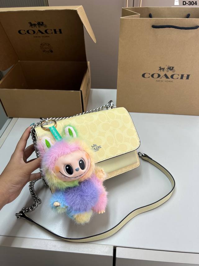 with Labubu pendant Coach cream yellow accordion bag Spring and summer and crea