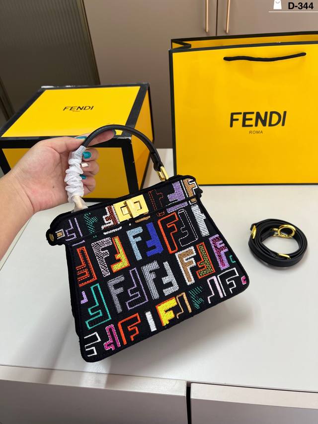 Fendi Peekaboo embroidered kitten bag Classic bag shape is cute and playful Can
