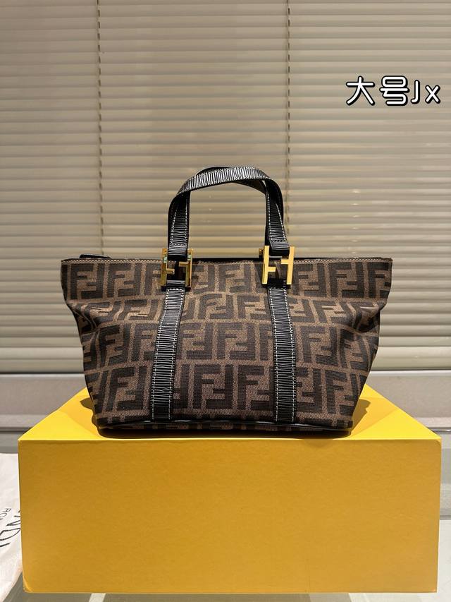 Large Fendi's quirky dumpling bag is so cute, it's so ugly! It's a unique piece.