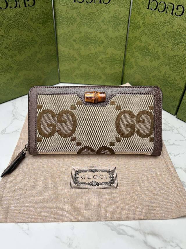 Color: Brown Size: 20X10 Ophidia Gg zip-around wallet. The Gg logo, introduced