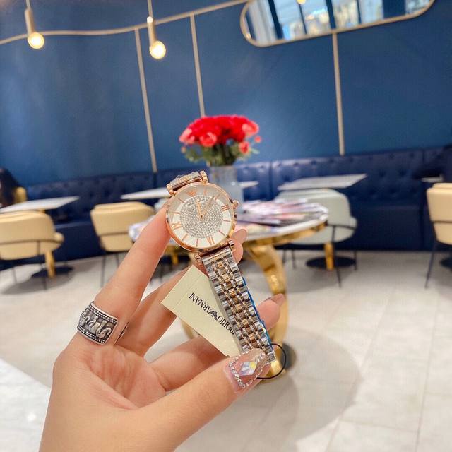 全网最低高品质阿玛尼满天星女表我想女孩子都喜欢这么一块Bling Bling的手表吧，男票们老公们 给自己的女朋友买一块吧 ！断货好久。图片拍不出实物的美，实物