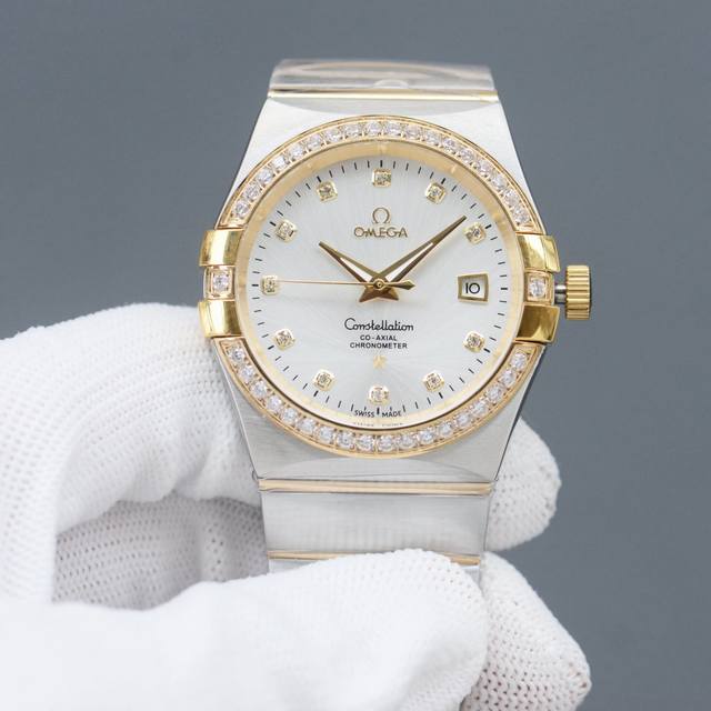 品牌：欧米茄 类型：三针同步双鹰系列 表带：顶级进口904精钢表带 机芯：可装2813-8215 镜面：顶级进口金刚膜水晶镜面 尺寸：原装正版尺寸38Mm ！