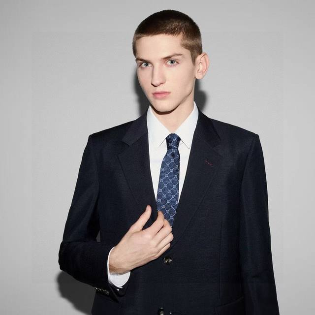 A new, officially synchronized design from TGOUGHI. This rare tie features the c