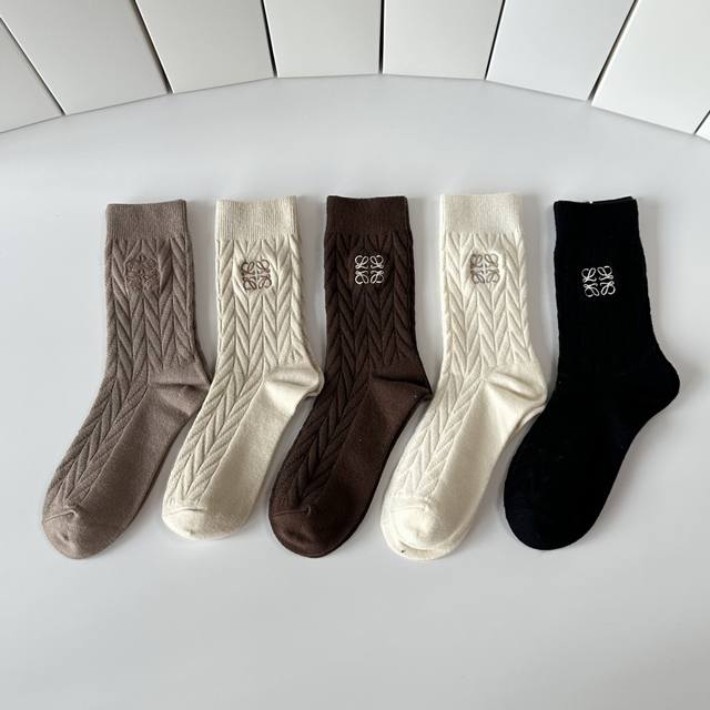 Special packaging for Loewe's new cashmere embroidered mid-calf socks! Five pair