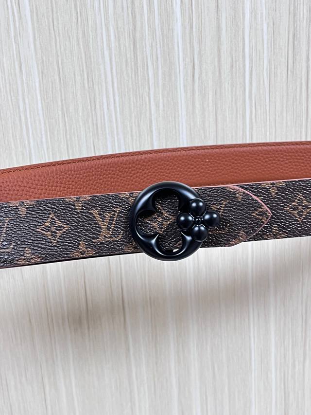 Flowergram Reversible Belt: This belt combines Monogram canvas and Monogram embo