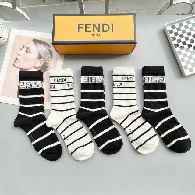 A box of five Fendi high socks with the classic double F logo, made of pure cott