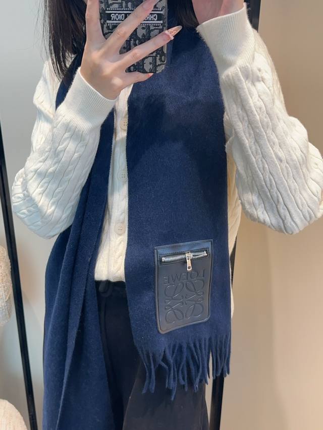 Loewe's rare gentle color scheme, understated yet elegant. Highly recommend the