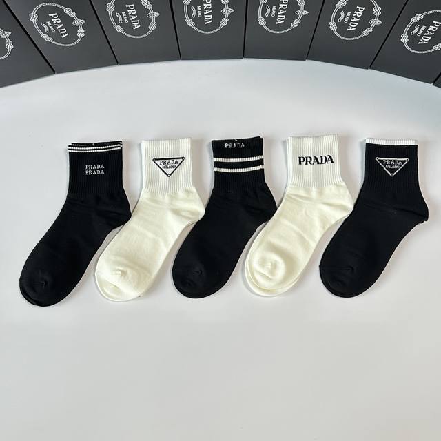 Special packaging for Prada's new mid-length slouch socks! Five pairs per box, s