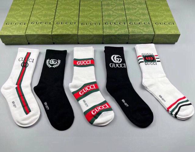 Gucci high-top socks, new arrival from the brand, five pairs per box. The classi