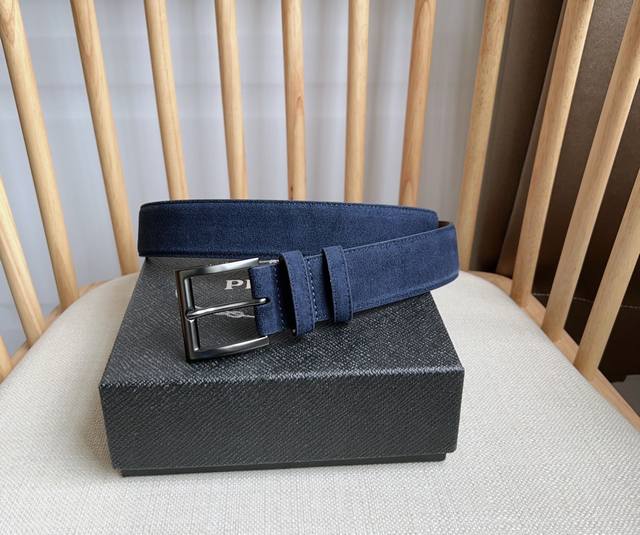 Prada's latest suede leather belt features a simple yet sophisticated style. The