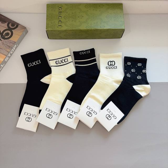 Includes 5 pairs of Gucci mid-calf socks per box. A super popular item on Insta