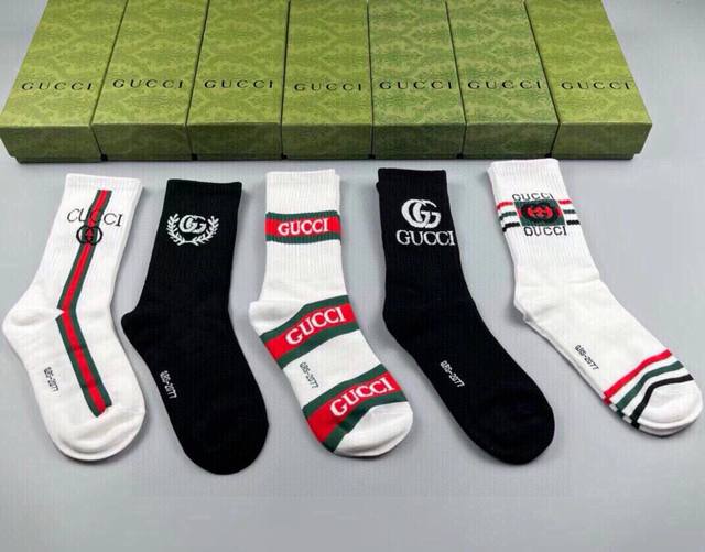 Gucci's new high-top socks, five pairs per box. The classic double G logo adds