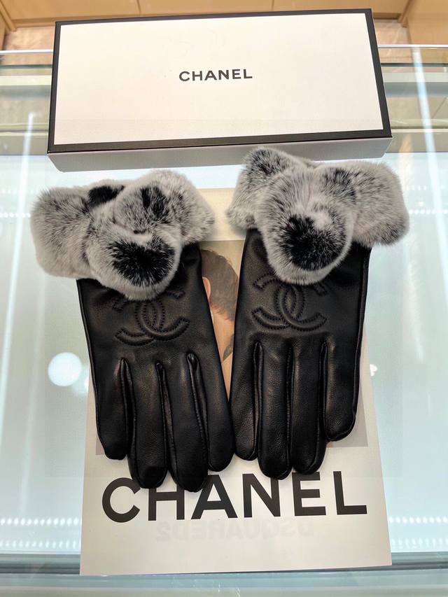 Chanel's latest embroidered double C logo glove. Made with imported Ethiopian le