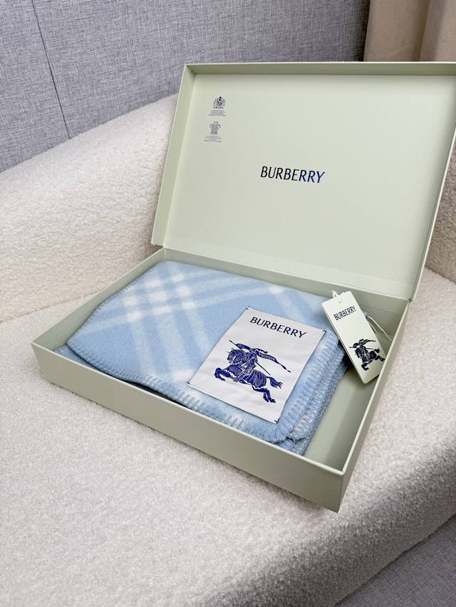 B Brand. A sophisticated and elegant milky blue scarf exuding understated luxury