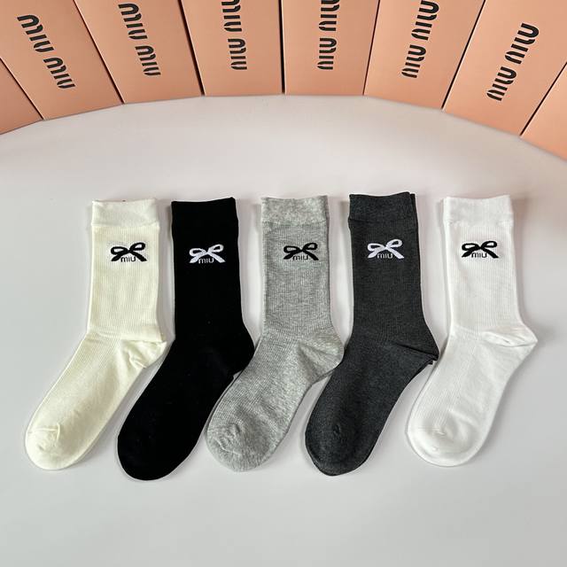 Special packaging for Miu Miu's new mid-length slouch socks! Five pairs per box,