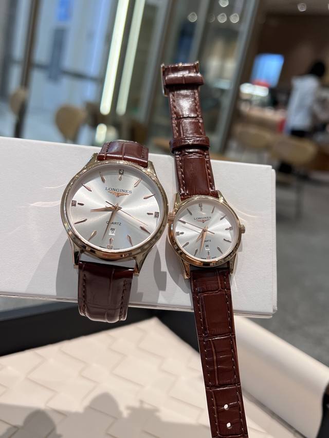 白 金 浪琴 情侣腕表 原装进口石英机芯 矿物质玻璃镜面 316L精钢表壳 直径男40Mm女30Mm 厚8Mm如果今天的阳光停止了它耀眼的光芒。那么你的一个微笑