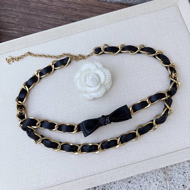 Chanel's latest design, pure copper waist chain with lambskin, classic elegance,