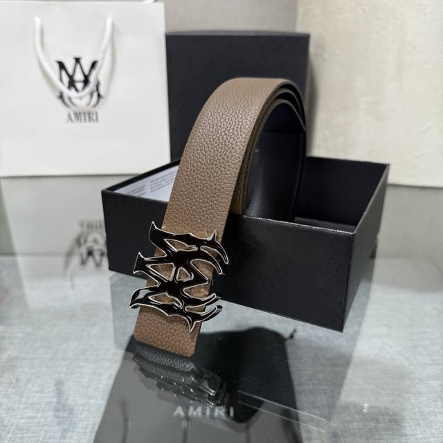 Amiri's latest trendy double-sided cowhide leather belt, complete with original