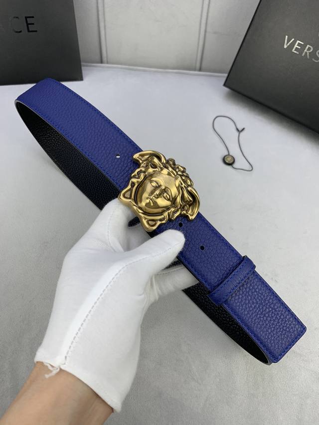 Width 4.0cm. This Versace belt with a matte finish features the iconic Versace