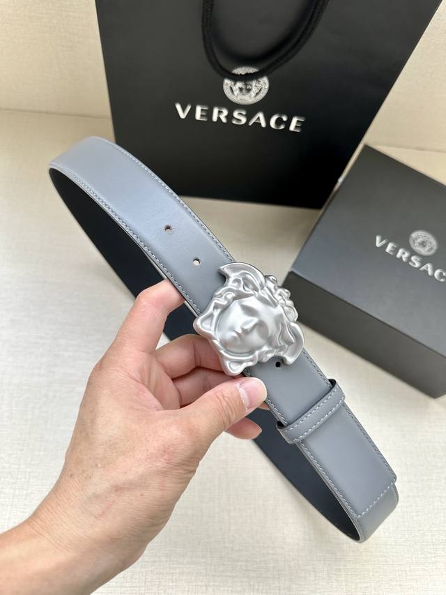 Width 4.0Cm This Versace belt features the brand's signature matte buckle and g