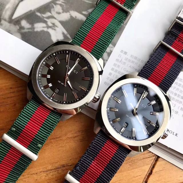 原盒:30.帅气十足 古驰 Gucci男士石英腕表！原装进口机芯！蓝宝石玻璃表盘！配的是尼龙表带！上手非常休闲！出游必备的款式！表盘40Mm纯原正品！可以保真的