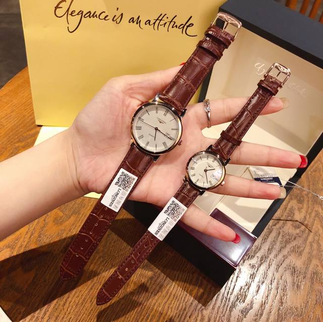 浪琴经典博雅系列罗马字面，进口石英机芯实体店必备爆款特别好卖浪琴原装表扣。拱形蓝光玻璃。男39Mm，女29Mm。间玫白面。