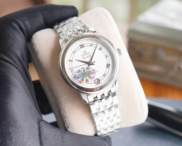 Mks 欧米茄 蝶飞经典女款系列 表壳 腕表尺寸32.7*9.5 正品一比一、厚度适合女性佩戴大小适中，弧形表圈圆润光滑，抛光打磨光亮有泽。实物效果保持mks一