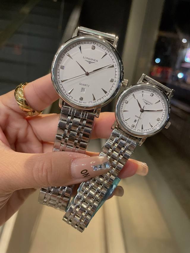 白 金 钢带20 浪琴-Longines 情侣对表 原装进口石英机芯 矿物质玻璃镜面 316L精钢表壳 直径男40Mm女30Mm 厚8Mm如果今天的阳光停止了它