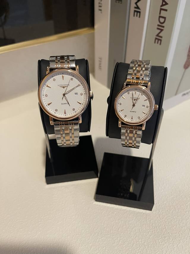 白壳 玫 钢带加20 实物拍摄 品牌： 浪琴-Longines 类型：情侣对表 表壳：316精钢 做工优质 表带：进口小牛皮 316精钢 两种可选 机芯：进口石