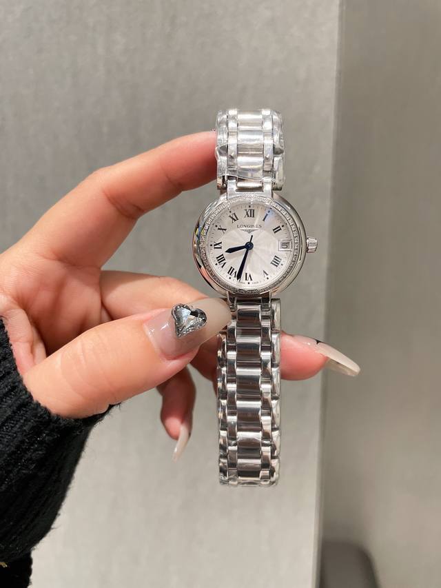 白 金 钻20 浪琴心月系列女士腕表， 正品一致 进口石英机芯，精钢圆形表壳，表径30.5Mm，抗磨损合成双卜蓝宝石玻璃 数据同步正品 ，A级深海白色珍珠母贝字