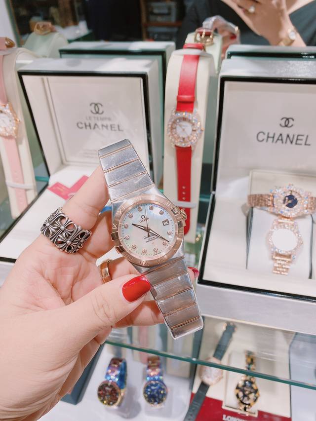 欧米茄、星座系列...情侣款间玫瑰金表带 石英进口机芯蓝宝石镜面直径：38mm 27mm