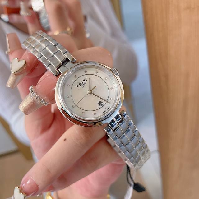 批： 、 原单专柜天梭最经典款式！天梭钢带款式！天梭t094系列石英腕表！佛拉明戈系列女士石英腕表！原装进口 F03.111-6H 瑞士机芯！非市面上朗达机芯。