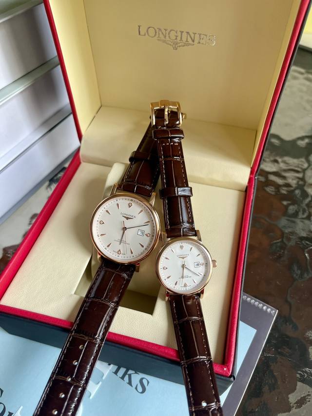 玫+20钢带20 浪琴情侣对表 原装进口石英机芯 矿物质玻璃镜面 316L精钢表壳 直径男40Mm女30Mm 厚8Mm 如果今天的阳光停止了它耀眼的光芒。那么你